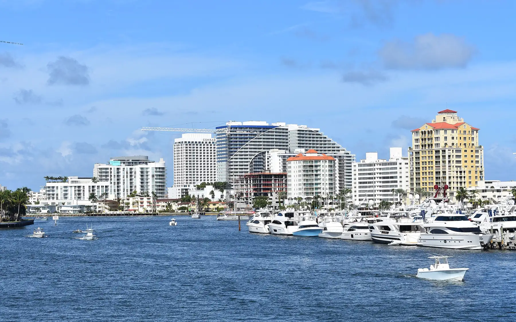 Beach towers and a marina on the Intracoastal seen from the Las Olas Boulevard bridge