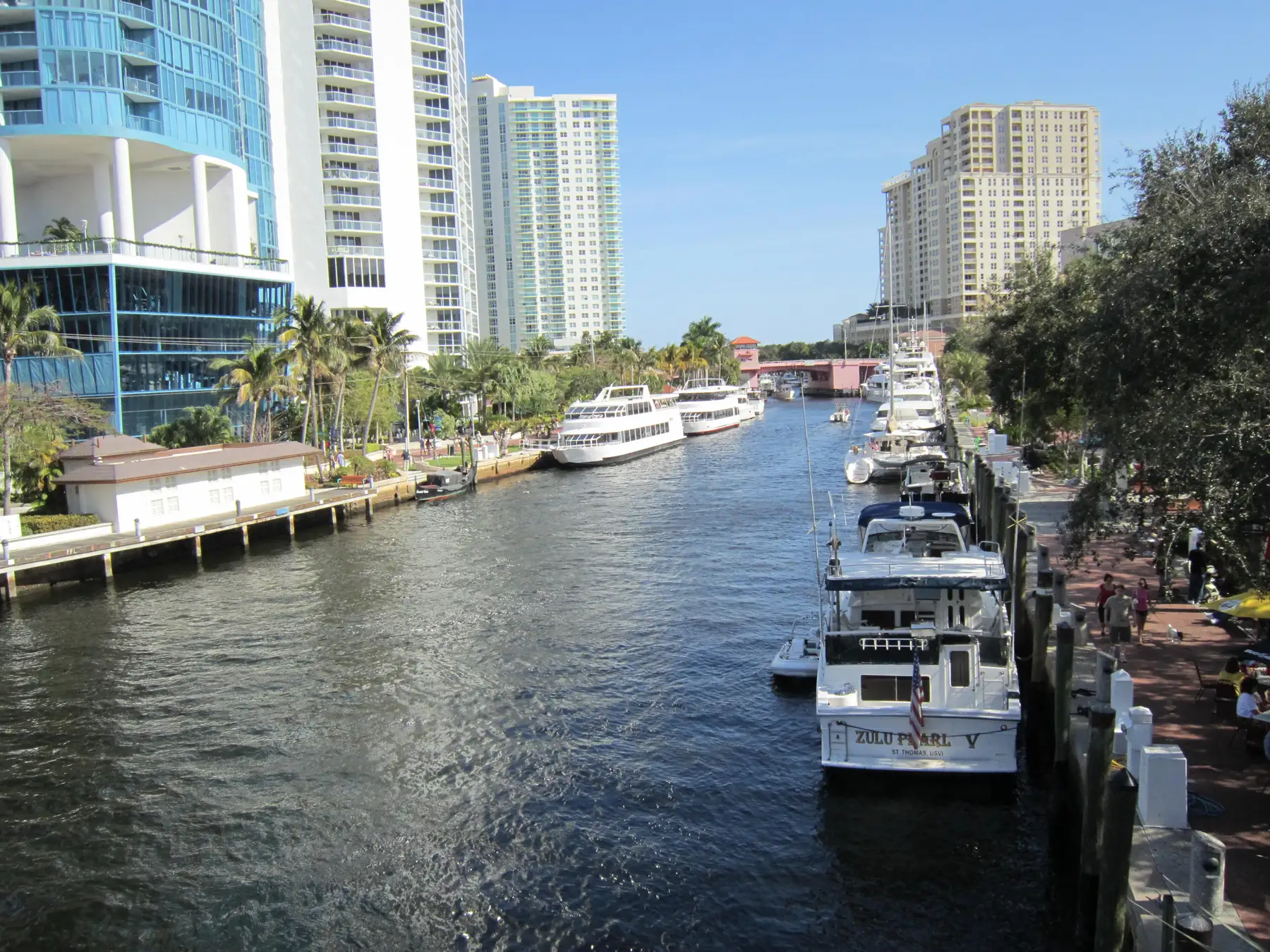Yachts moored along the Riverwalk on the New River in downtown Fort Lauderdale