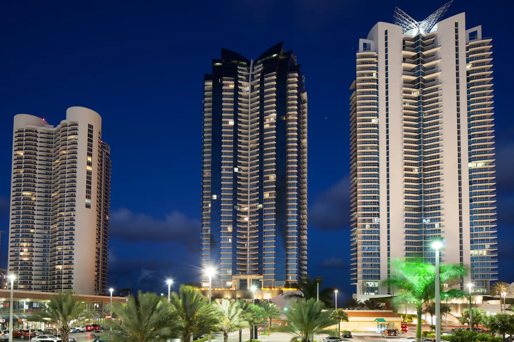 Ocean Four (left), Jade Ocean and Jade Beach at night, from Collins Avenue — Ocean Four, Sunny Isles Beach