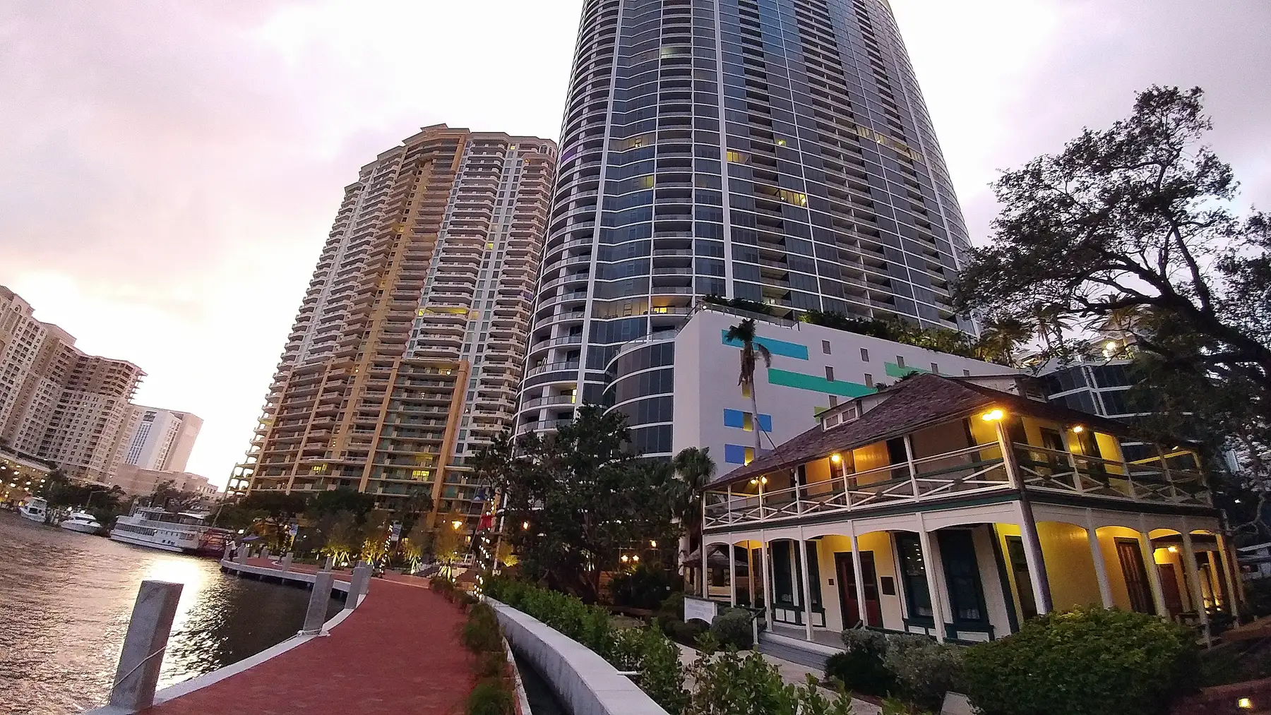 The Riverwalk at dusk by the historic Stranahan House — Las Olas River House, Fort Lauderdale